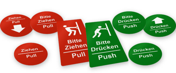 Push/Pull-Türschilder in Rot und Grün: rechteckiges Paar „Bitte Ziehen / Pull“ und „Bitte Drücken / Push“ in der Mitte, links rote runde Schilder „Ziehen“, rechts grüne runde Schilder „Drücken“ mit Pfeil und Schrift
